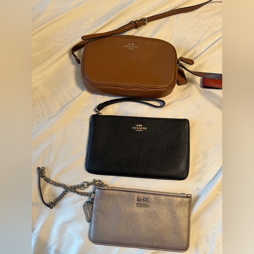 Coach Brown, Black, and Tan Clutches & Wristlets